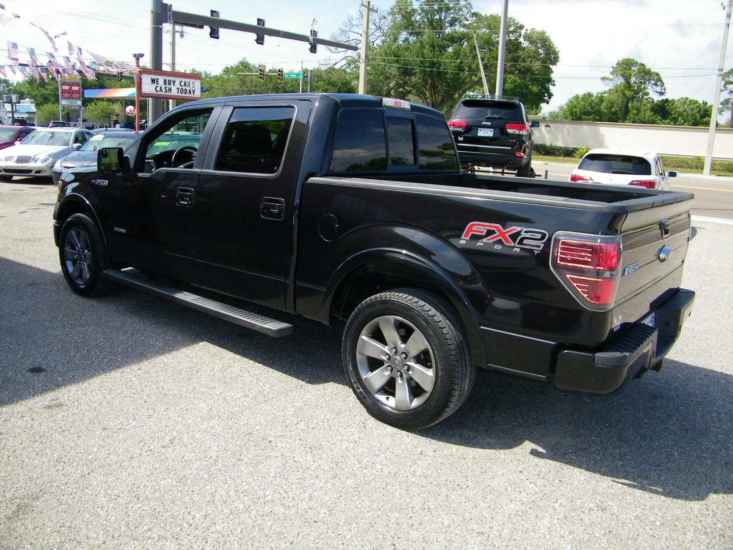 2012 Black /Black Ford F-150 Platinum SuperCrew 6.5-ft. Bed 2WD (1FTFW1CT9CK) with an 3.5L V6 TURBO engine, 6-Speed Automatic transmission, located at 4000 Bee Ridge Road, Sarasota, FL, 34233, (941) 926-0300, 27.298664, -82.489151 - Photo#3